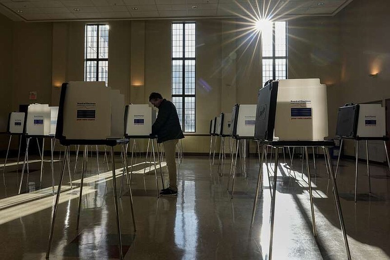 A voter fills out their Ohio primary election ballot at a polling location in Knox Presbyterian Church in Cincinnati, Ohio, on Tuesday, March 19, 2024. (AP Photo/Carolyn Kaster)