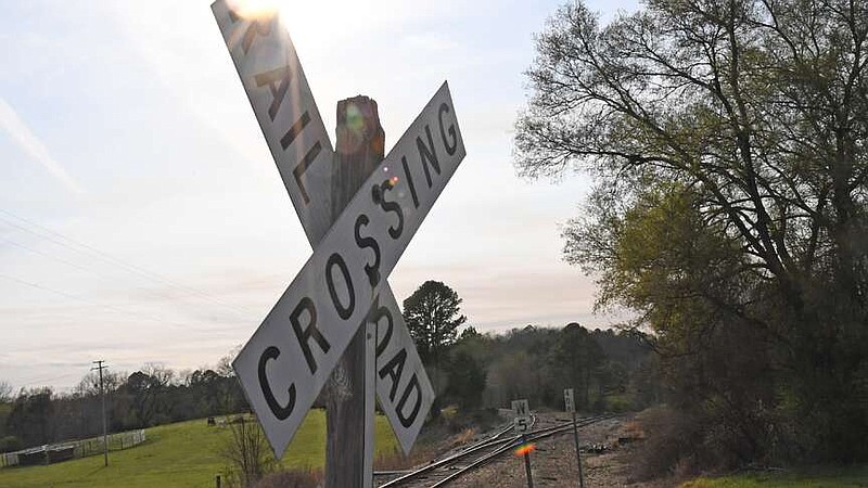 A railroad crossing sign is shown Wednesday at Guy and Spring Street. (The Sentinel-Record/Lance Brownfield)