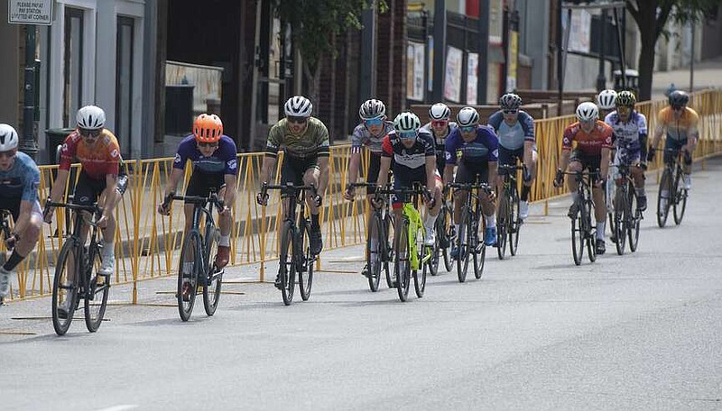 Cyclists compete May 21 in the criterium portion of the 46th annual Joe Martin Stage Race in downtown Fayetteville. This year's event has been canceled because of rising production costs and limited sponsorship, according to a news release. (File photo/NWA Democrat-Gazette/J.T. Wampler)



�