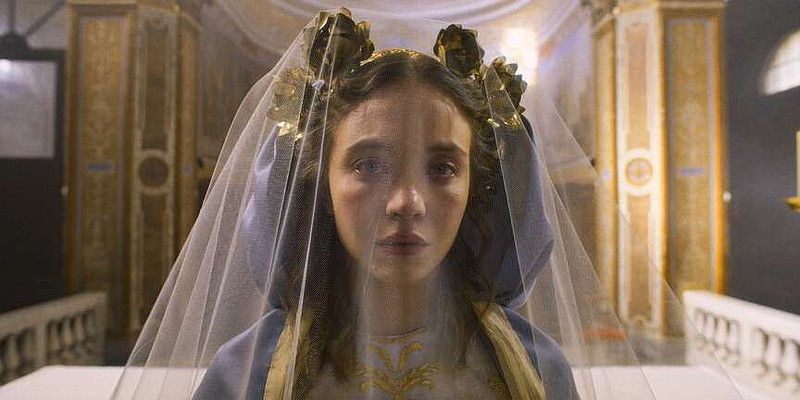 This image released by Neon shows Sydney Sweeney in a scene from the film "Immaculate." (Neon via AP)
