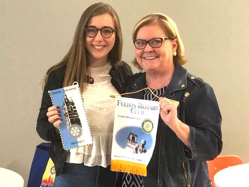 Submitted photo
Laura Derenne and Debbie Laughlin exchange banners during Laura's year at Fulton High School in 2018-19.