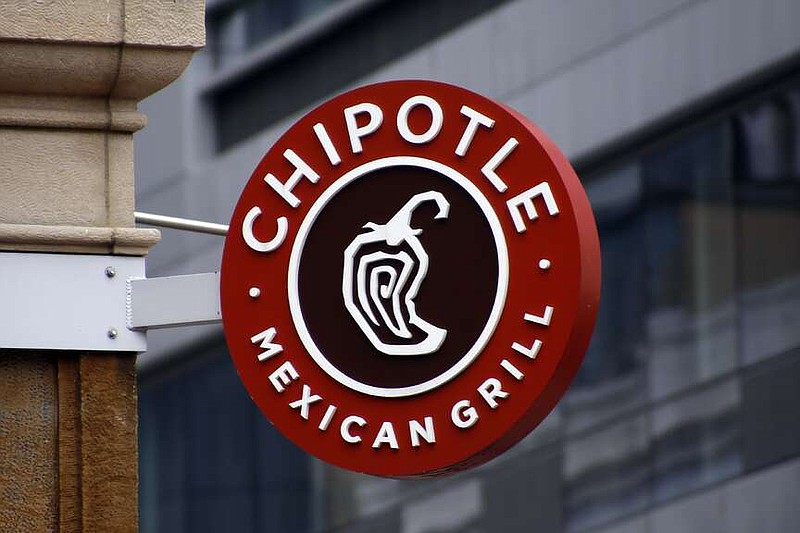 FILE - A sign for the Chipotle restaurant in Pittsburgh's Market Square is seen on Feb. 8, 2016. Chipotle Mexican Grill's board has approved a 50-for-1 stock split. In an announcement Tuesday, March 20, 2024, the burrito chain lauded the proposed split as one of the biggest in New York Stock Exchange history — while noting it believed the move would also boost accessibility of the company's stock. (AP Photo/Keith Srakocic, File)