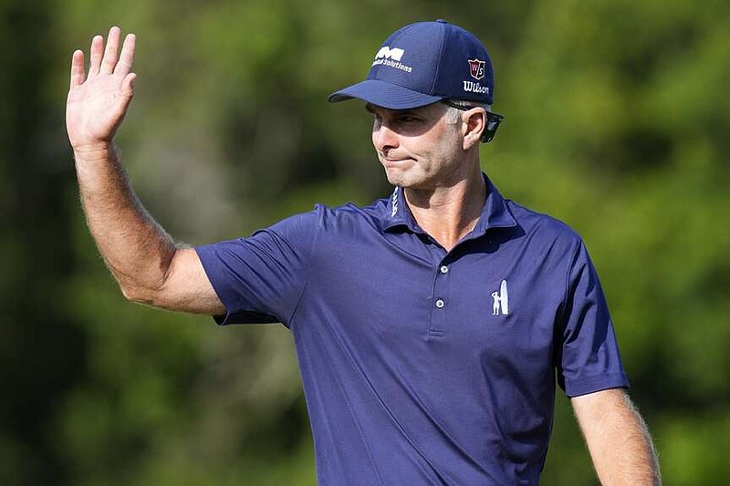 Kevin Streelman waves to the gallery after making his putt on the seventh hole during the first round of the Valspar Championship golf tournament Thursday, March 21, 2024, at Innisbrook in Palm Harbor, Fla. (AP Photo/Chris O'Meara)