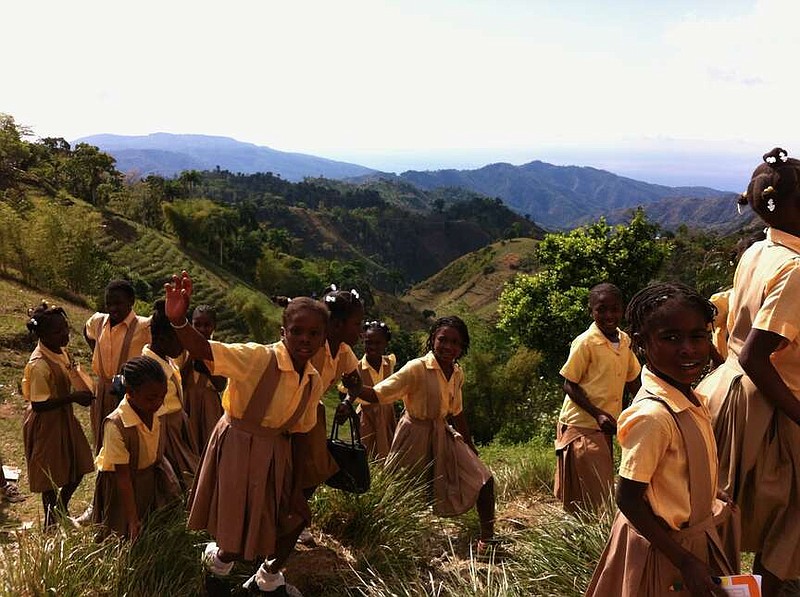 A group of Haitian students walk home from school in the mountains. (Submitted photo)