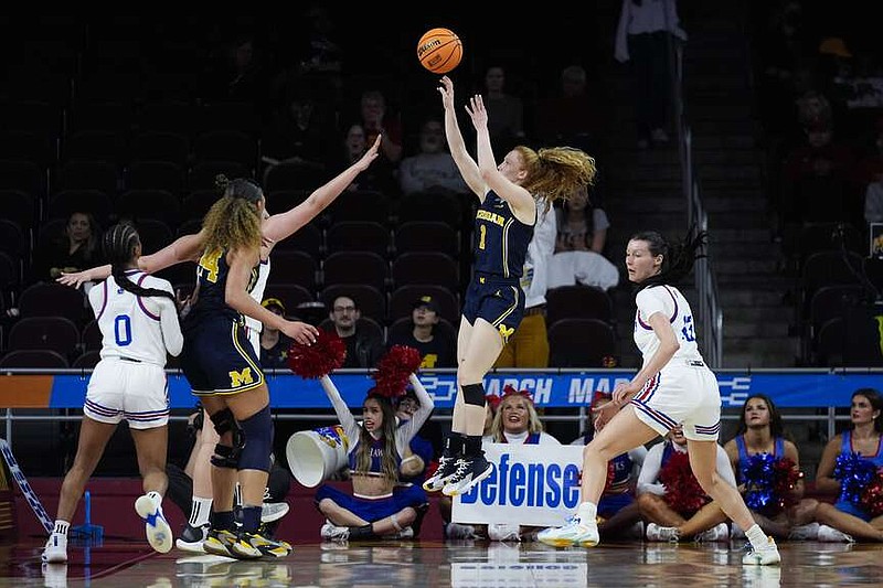 Michigan guard Lauren Hansen (1) shoots during a first-round college basketball game against Kansas in the women's NCAA Tournament in Los Angeles, Saturday, March 23, 2024. (AP Photo/Ashley Landis)