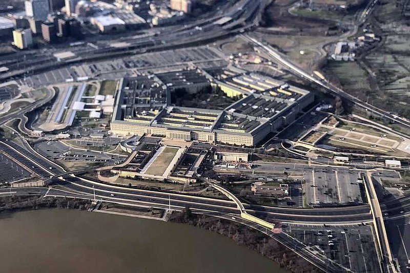 FILE - The Pentagon is seen in this aerial view made through an airplane window in Washington, Jan. 26, 2020. The Defense Department found $300 million for weapons for Ukraine in March 2024, even though the bill to fund the military aid is stalled in Congress. (AP Photo/Pablo Martinez Monsivais, File)