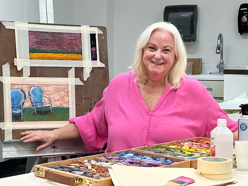 Kelly Campbell with art supplies set-up for Pastel Workshop (Contributed)