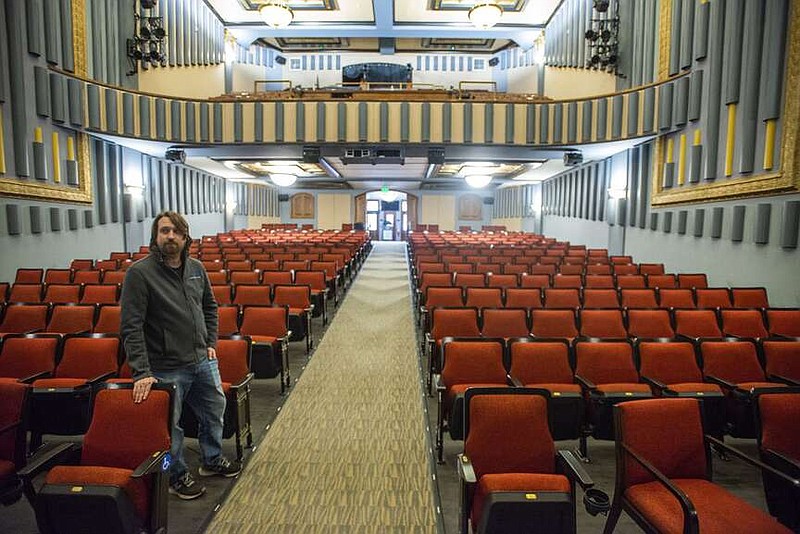 Justin Pounds, Rogers arts and culture venue supervisor, shows off the recently completed renovation to Victory Theater on Friday in Rogers. The renovation work totaling over $2.5 million added seating and upgraded the sound and light systems. Visit nwaonline.com/photo for today's photo gallery.

(NWA Democrat-Gazette/J.T. Wampler)