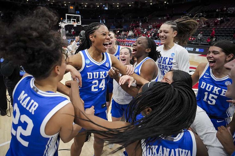 Duke guard Reigan Richardson (24) celebrates with teammates after defeating Ohio State during a second-round college basketball game in the women's NCAA Tournament, Sunday, March 24, 2024, in Columbus, Ohio. (AP Photo/Aaron Doster)