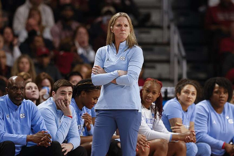 North Carolina head coach Courtney Banghart, center, watches her team play against South Carolina during the second half of a second-round college basketball game in the women's NCAA Tournament in Columbia, S.C., Sunday, March 24, 2024. (AP Photo/Nell Redmond)