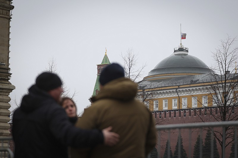 Russian President's Flag flies at half mast over the Kremlin in Moscow, Russia, Sunday, March 24, 2024. Russia observed a national day of mourning on Sunday, two days after an attack on a suburban Moscow concert hall that killed over 130 people. (AP Photo/Vitaly Smolnikov)