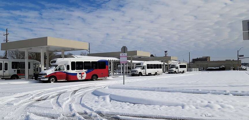 Texarkana's Urban Transit District (T-Line) buses huddle at their Texas Boulevard terminal on Tuesday, Feb. 16, 2021, in Texarkana, Texas. (Gazette file photo)