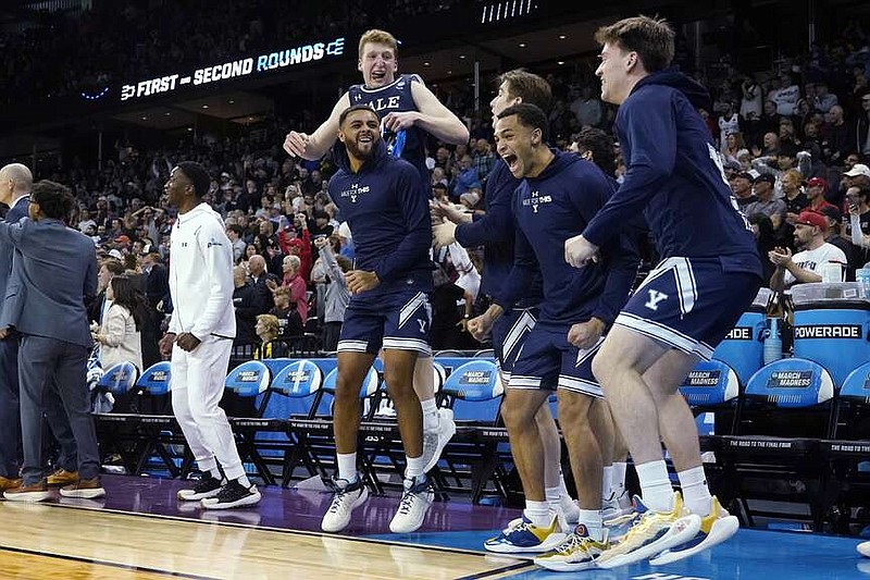 Yale players react on the bench during the second half of Yale's upset of Auburn in Friday's first-round game in the men's NCAA Tournament in Spokane, Wash. (AP Photo/Ted S. Warren)