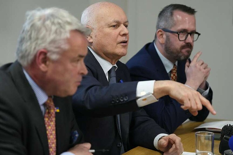 British Members of Parliament, Tim Loughton, from left, Iain Duncan Smith, and Stewart McDonald attend a press conference in London, Monday, March 25, 2024. Britain's government is expected to blame a string of cyberattacks targeting the U.K.'s election watchdog and lawmakers on hackers linked to the Chinese government. (AP Photo/Kirsty Wigglesworth)