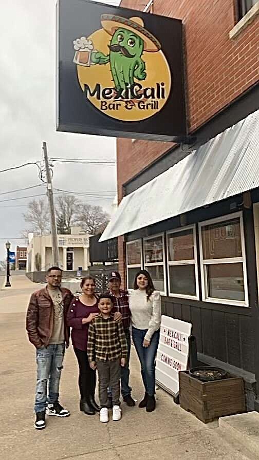 Courtesy/Katie Minard 
From left, Fernando Martinez, Delores Martinez, Jose Martinez, Lorena Martinez and her son stand together as they establish their new family business - MexiCali Bar and Grill.