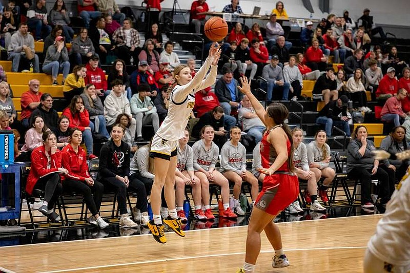 Fulton's Audrey Arnold shoots a 3-pointer against Mexico on Feb. 13 at Fulton High School in Fulton. Still a sophomore, Arnold received three postseason accolades this season. (Shawley Photography/Courtesy)
