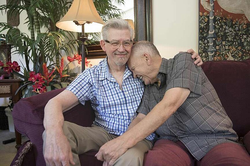 Charles Dillard, aka Mr. Charlie Brown, right, and Fred Wise laugh while sitting for a photo at their residence in Austell, Georgia, on May 29, 2019. (Alyssa Pointer/The Atlanta Journal-Constitution/TNS)