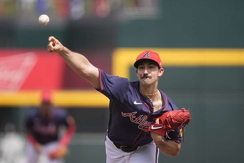 Atlanta Braves starting pitcher Spencer Strider throws in the first inning of a spring training baseball game against the Detroit Tigers in North Port, Fla., Tuesday, March 5, 2024. (AP Photo/Gerald Herbert)