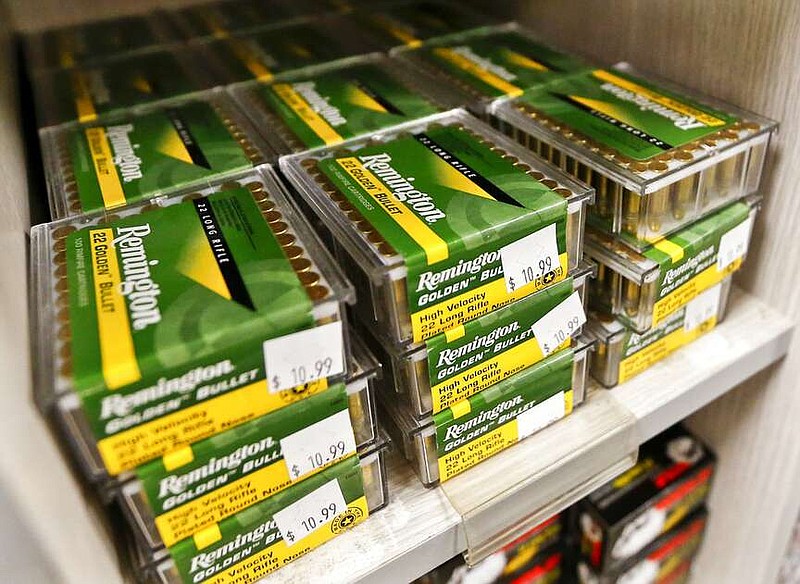 FILE- In this March 1, 2018, file photo Remington .22 LR ammunition is for sale at Duke's Sport Shop in New Castle, Pa.  (AP Photo/Keith Srakocic, File)