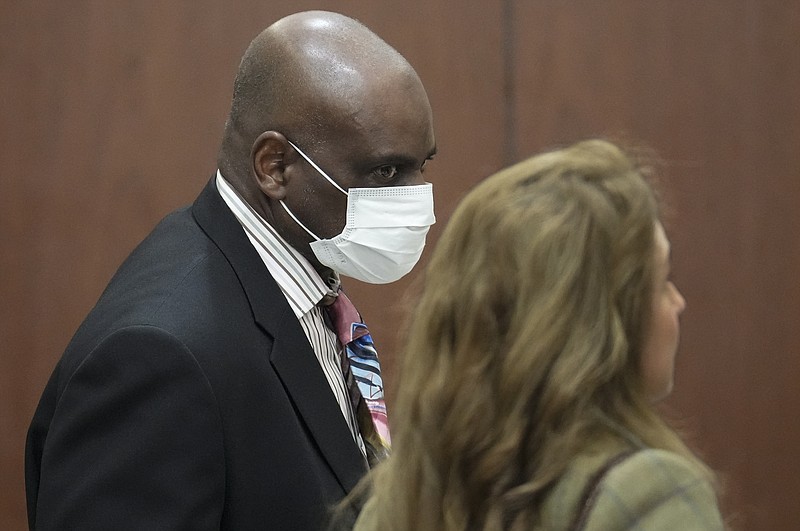Retired Houston Police Department officer Gerald Goines leaves the court after the Judge Veronica M. Nelson of 482nd District Court quashed two felony murder indictments against him, Tuesday, March 26, 2024 at Harris County Criminal Courts at Law in Houston. (Yi-Chin Lee/Houston Chronicle via AP)
