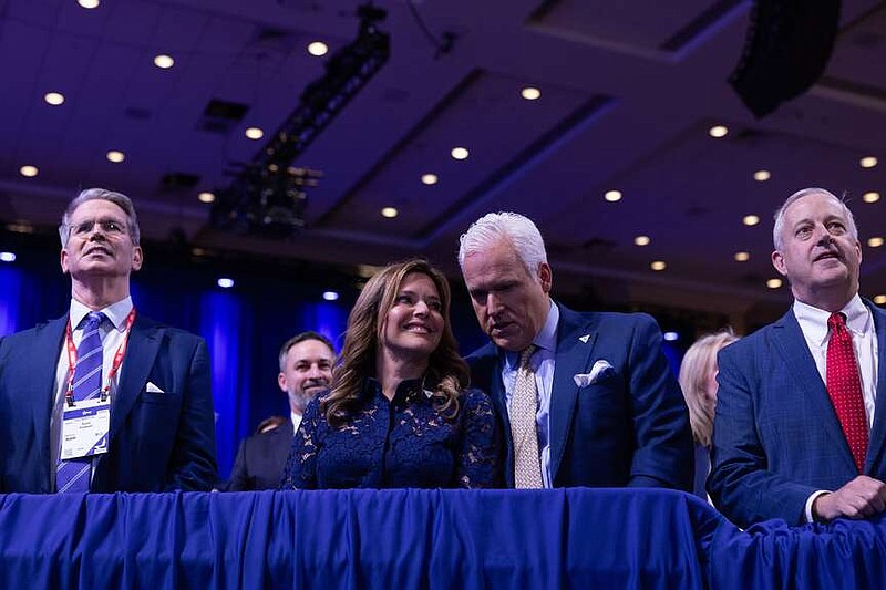 Conservative Political Action Conference Chair Matt Schlapp, second from right, and his wife, Mercedes Schlapp, watch former president Donald Trump speak in February. MUST CREDIT: Tom Brenner for The Washington Post