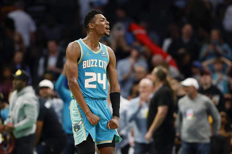 Charlotte Hornets forward Brandon Miller reacts to the team's win over the Cleveland Cavaliers in an NBA basketball game in Charlotte, N.C., Wednesday, March 27, 2024. (AP Photo/Nell Redmond)
