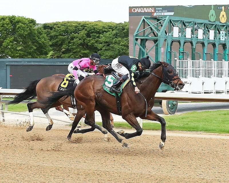 Calibrate (5), under Francisco Arrieta, beats out Lone Rock (6) to win the $150,000 Temperence Hill Stakes on April 2, 2023, at Oaklawn. (Submitted photo courtesy of Coady Photography)