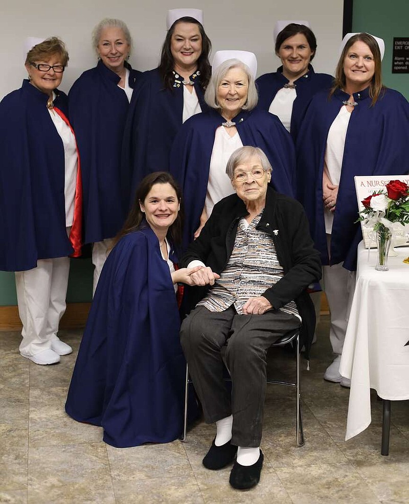 Members of the Arkansas Nurses Honor Guard honor Cora Mae Summers, bottom right, Jan. 26, 2024, in Crossett. Summers turned 100 weeks earlier. (Special to The Commercial/University of Arkansas at Monticello)