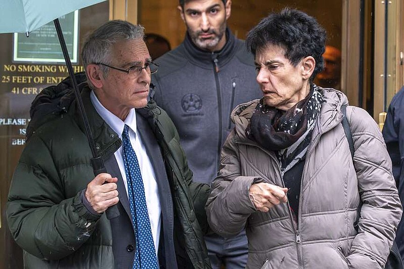 Barbara Fried and Joseph Bankman, parents of FTX founder Sam Bankman-Fried, exit the Manhattan Federal Court, Thursday, March 28, 2024, in New York. Crypto entrepreneur Sam Bankman-Fried was sentenced Thursday to 25 years in prison for a massive fraud that unraveled with the collapse of FTX, once one of the world's most popular platforms for exchanging digital currency. (AP Photo/Eduardo Munoz Alvarez)
