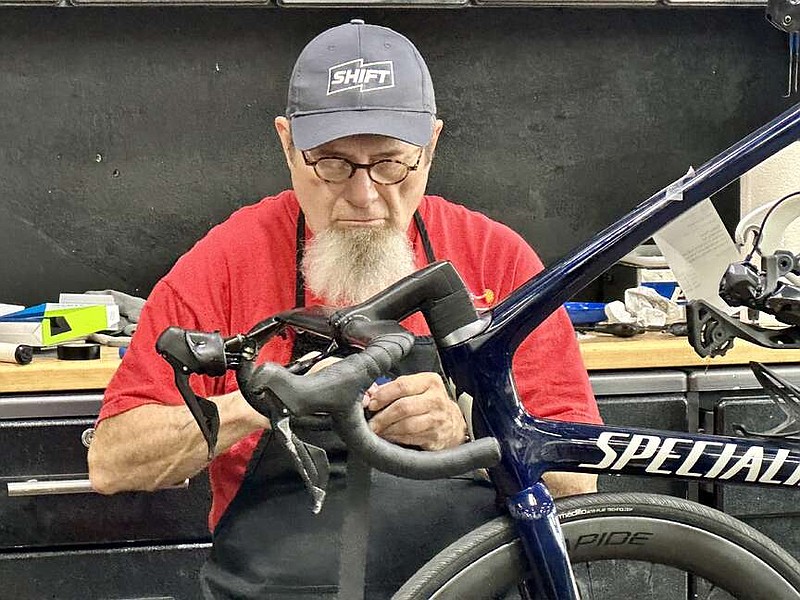 Van Reid is retired optometrist who now does full-time repair work at Shift Modern Cyclery at 1101 W. Markham St. in Little Rock. Riding and cycling keeps the 71-year-old's "mind clicking," he said on March 7.