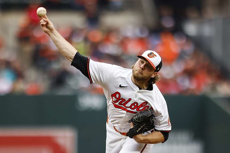 Orioles starting pitcher Corbin Burnes (39) throws during the second inning of a baseball game against the Los Angeles Angels, Thursday, March 28, 2024, in Baltimore. (AP Photo/Julia Nikhinson)