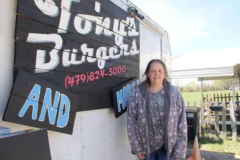 Lynn Kutter/Enterprise-Leader
After about seven years, Tony's Burgers and More has moved to a new location in Lincoln, the old car wash which has a facelift and will become the Wolf Den Food Court. Tina Cook manages the food truck and says she especially enjoys seeing regular customers each week.