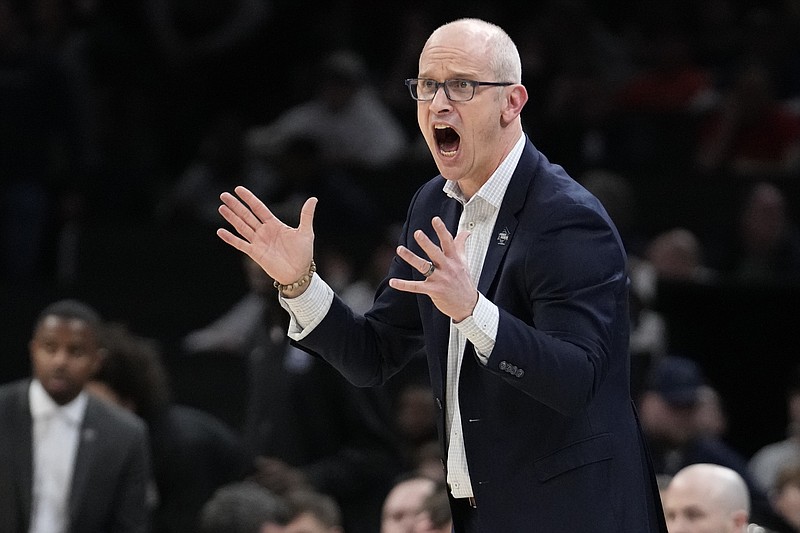UConn head coach Dan Hurley calls towards his players during the first half of the Elite 8 college basketball game against Illinois in the men's NCAA Tournament, Saturday, March 30, 2024, in Boston. (AP Photo/Steven Senne)