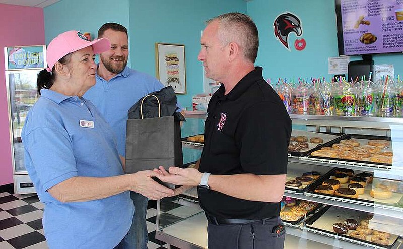 Annette Beard/Pea Ridge TIMES
Daylight Donuts celebrated opening with a ribbon cutting Friday, March 29, 2024. For more photographs, go to the PRT gallery at https://tnebc.nwaonline.com/photos/.