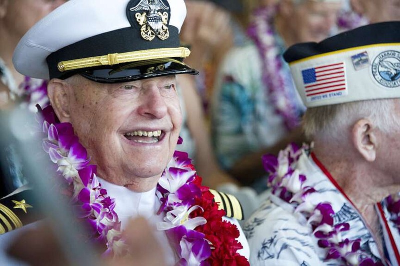 FILE - Lou Conter, an Arizona crewman, attends ceremonies for the 75th anniversary of the Japanese attack on Pearl Harbor, Dec. 7, 2016, in Honolulu. Conter, the last living survivor of the USS Arizona battleship that exploded and sank during the Japanese bombing of Pearl Harbor, died on Monday, April 1, 2024, following congestive heart failure, his daughter said. He was 102. (Craig T. Kojima/Honolulu Star-Advertiser via AP, Pool, File)