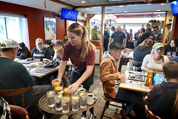 March's 303,000 jobs lift economic outlook | Northwest Arkansas Democrat-Gazette - Vimarsana News