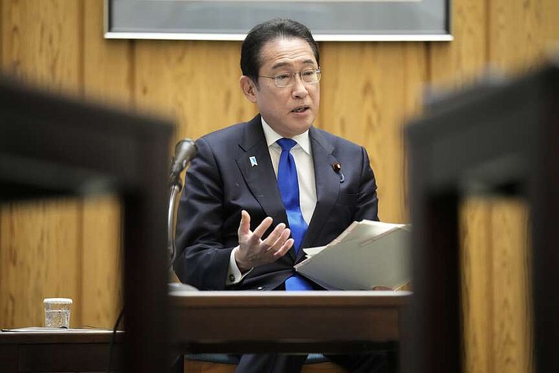 Japan's Prime Minister Fumio Kishida speaks during an interview with foreign media members ahead of an official visit to the United States at the Prime Minister's official residence Friday, April 5, 2024, in Tokyo. (AP Photo/Eugene Hoshiko)