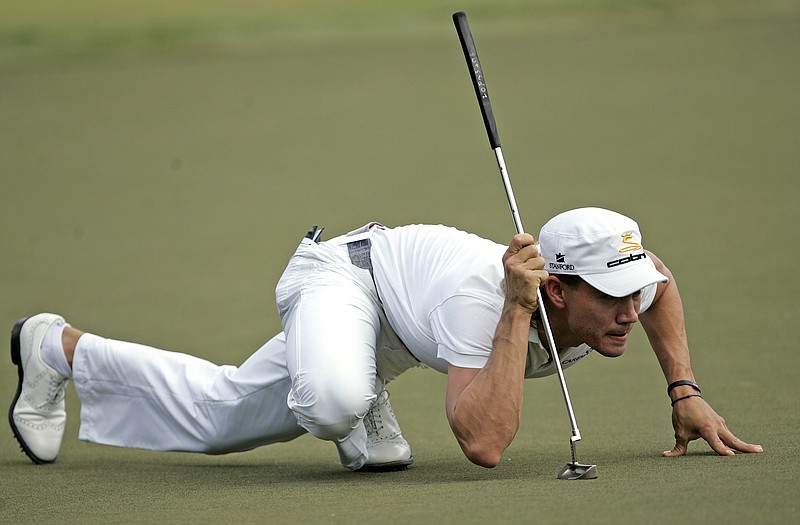 FILE - Camilo Villegas lines up a putt on the third green during the final round of the Tour Championship golf tournament at East Lake Golf Club in Atlanta, Sunday, Sept. 28, 2008. Villegas is back in the Masters for the first time in nine years. (AP Photo/John Amis, File)