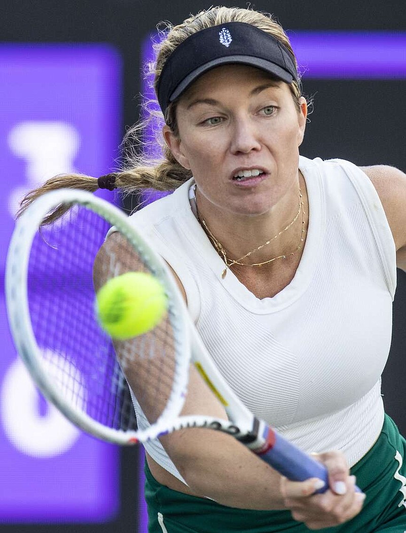 Danielle Collins returns the ball in a match against Ons Jabeur at the Charleston Open tennis tournament Thursday, April 4, 2024, in Charleston, S.C. (Henry Taylor/The Post And Courier via AP)