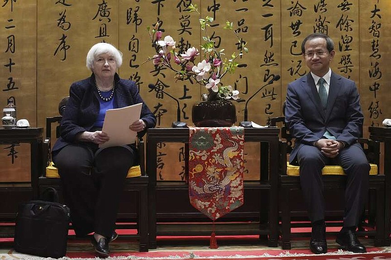 U.S. Treasury Secretary Janet Yellen, left, meets with Beijing Mayor Yin Yong at the Beijing International Hotel in Beijing, China, Sunday, April 7, 2024. Yellen, who arrived later in Beijing after starting her five-day visit in one of China's major industrial and export hubs, said the talks would create a structure to hear each other's views and try to address American concerns about manufacturing overcapacity in China. (AP Photo/Tatan Syuflana, Pool)