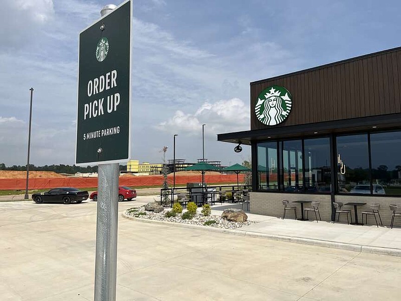 The sun may have been blocked by the moon for some time on Monday, but that didn't stop a new business from shining. A third Starbucks location in Texarkana played host to new guests. The coffee shop opened April 8 coinciding with the solar eclipse. Its is located at 5211 Park Blvd. next to Walk On's Sports Bistro. (Staff photo by James Bright)