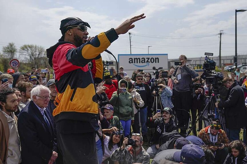FILE - Chris Smalls, president of the Amazon Labor Union, speaks at a rally outside an Amazon warehouse on Staten Island in New York, April 24, 2022. Within union ranks, some felt Smalls was spending too much time traveling and giving speeches instead of organizing workers on Staten Island. (AP Photo/Seth Wenig, File)