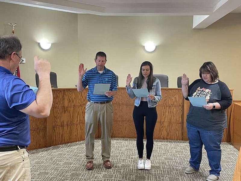 Democrat photo/Kaden Quinn
From left, Bryan Lawson, Kim Robertson and Ronnie Korte take oath of office as they are reinstated into the City of California Board of Aldermen.