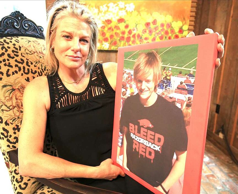 Arkansas Democrat-Gazette/STATON BREIDENTHAL --5/22/17-- Piper Partridge with a photo of her son, Keagan Schweikle, 17, who was shot and killed by the Benton Police Department.