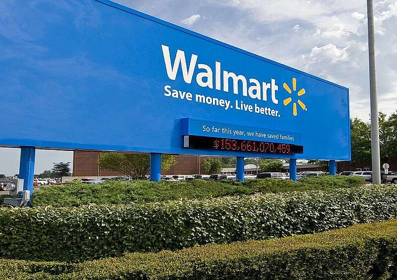 This undated file photo shows the Walmart sign in front of its headquarters in Bentonville, Ark. (Arkansas Democrat-Gazette).
