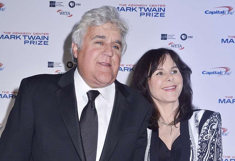 Jay Leno, left, and Mavis Leno walk the red carpet during the Kennedy Center's Mark Twain Prize for American Humor at the John F. Kennedy Center for the Performing Arts on Oct. 19, 2014, in Washington, D.C. (Kris Connor/Getty Images/TNS)