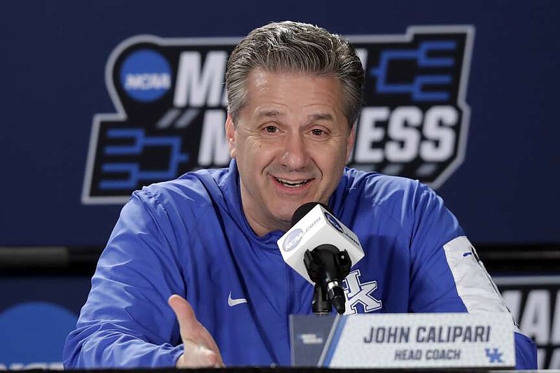 FILE - Kentucky head coach John Calipari talks to reporters during news conference at the NCAA college basketball tournament Friday, March 16, 2018, in Boise, Idaho. Arkansas hired Calipari as their men's basketball coach, Wednesday,April 10, 2024, one day after the Hall of Fame coach stepped down from the Kentucky program he led to the 2012 NCAA championship. (AP Photo/Ted S. Warren, File)