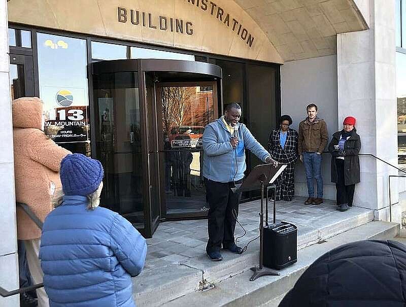 D'Andre Jones, Fayetteville City Council member, speaks March 18 during a rally outside Fayetteville City Hall in support of a resolution he sponsored declaring a housing crisis in the city. 
(File photo/NWA Democrat-Gazette/Stacy Ryburn)