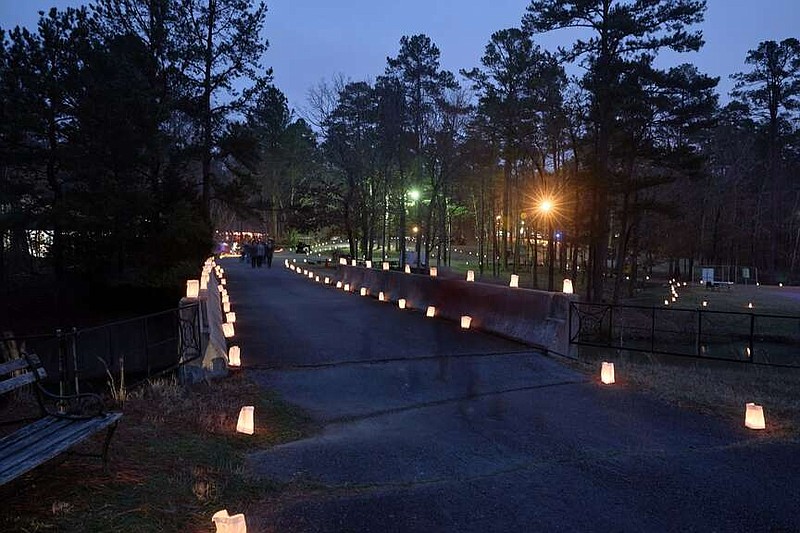 Luminarias illuminate the paths between “cultures” and Wildwood's Cabe Festival Theatre.

(Special to the Democrat-Gazette/Kelly Hicks Photography)