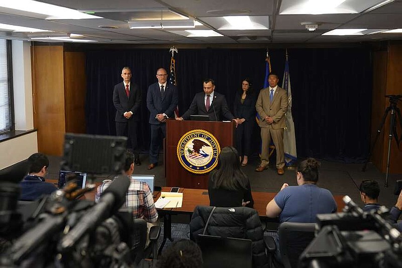 U.S. Attorney Martin Estrada, center, announces charges against the former longtime interpreter for Los Angeles Dodgers star Shohei Ohtani during a news conference Thursday, April 11, 2024, in Los Angeles. Ippei Mizuhara is being charged with federal bank fraud for crimes involving gambling debts and theft of millions of dollars from the Japanese sensation, federal authorities said. (AP Photo/Ryan Sun)